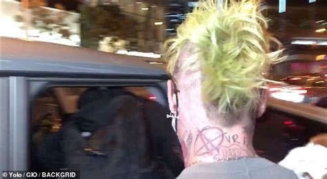Mod Sun Shows Off A Tattoo Of Rumored New Girlfriend Avril Lavignes Name On The Back Of His