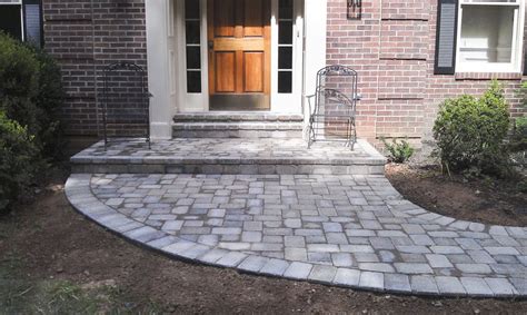 The final hardscape element is a new front paver sidewalk that connects the new front landing to the driveway staircase. Front-Pavers-0012 (With images) | Paver walkway, Front ...