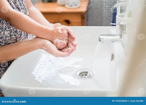Mother And Child Wash Hands With Soap In Washbasin Stock Photo Image