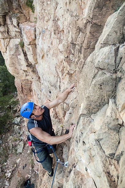 Best Men Struggle Rock Climbing Mountain Climbing Stock