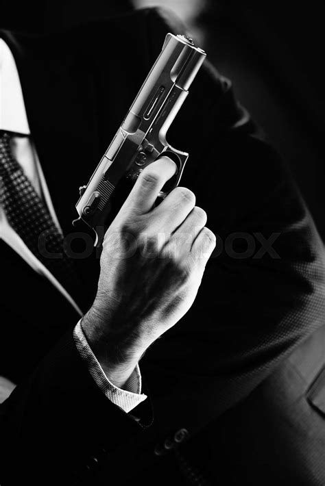 Elegant Man Holding Gun Stock Image Colourbox