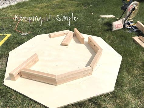 There are always a number of fire pits on offer and sometimes you can get a cheap deal on bundled offers. Backyard Ideas- DIY Fire Pit Cover • Keeping it Simple