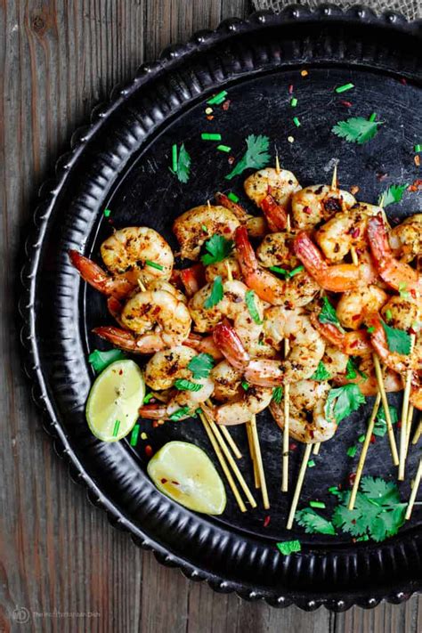 Thread the shrimp onto skewers and brush the grill grates with vegetable oil. Mediterranean Garlic Shrimp Skewers Recipe | The Mediterranean Dish