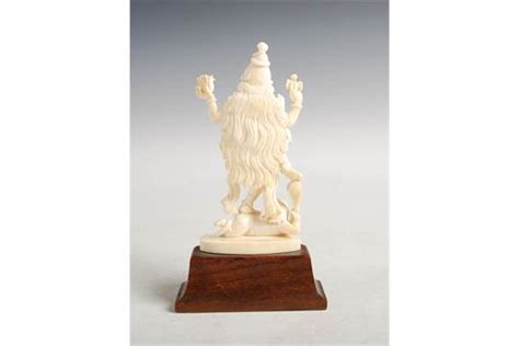 A Late 19th Early 20th Century Indian Ivory Figure Of Shiva On Carved
