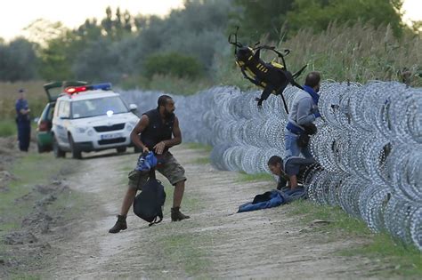Photos Refugees Barbed Wire At Hungarian Border Al Jazeera America