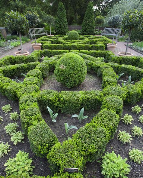 A neat way to design herb beds is to plant individual herb varieties according to their height. Martha's Culinary Herb Garden | Martha Stewart