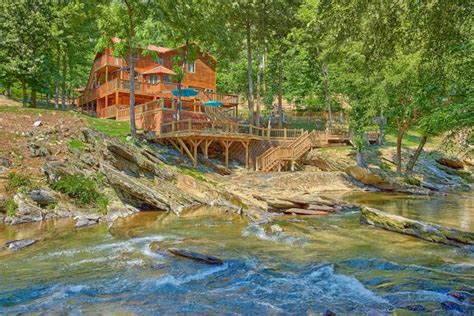 Welcome valley village also offers five log cabins tucked into beautiful woods, but is located along the ocoee river near benton, tn (45 minutes from downtown). "River Adventure Lodge" Pigeon Forge Cabin With Swim Spa