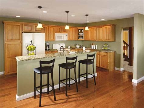 White is suggested for kitchen paint color with light oak cabinets. Light mint green kitchen with oak cabinets and white ...