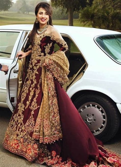 India is a country rich of colours and traditions. Wine Color Bridal Lehenga | Pakistani bridal dresses ...