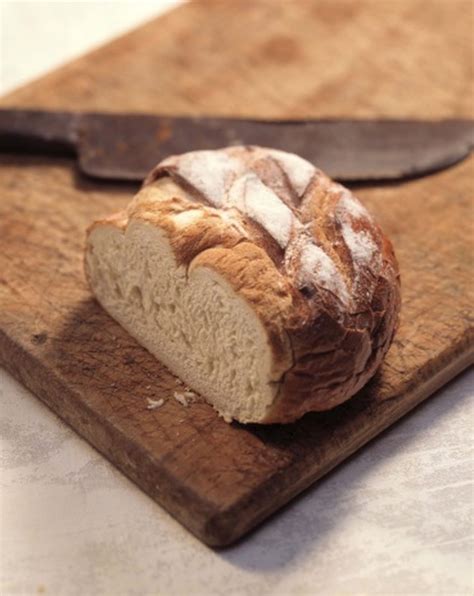 Remove the bread from the oven and allow to cool for at least 5 minutes before slicing and serving. How to Bake Bread in Romertopf Clay Pots | Livestrong.com