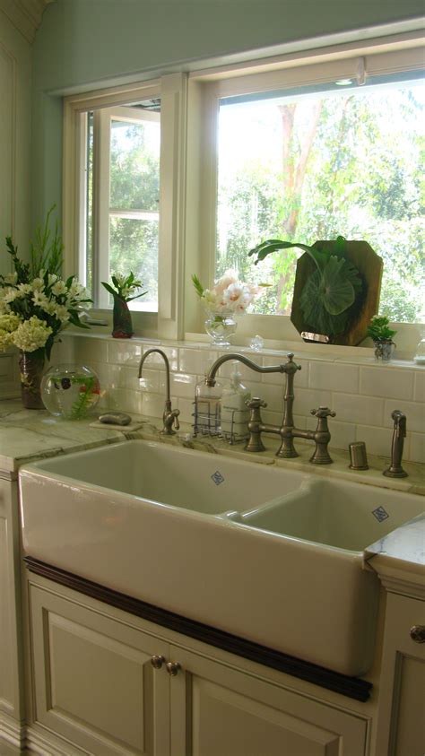 Fireclay is a material that has been fired at a temperature of around sixteen hundred degrees. LOVE that double sink and polished hardward | Kitchens I ...