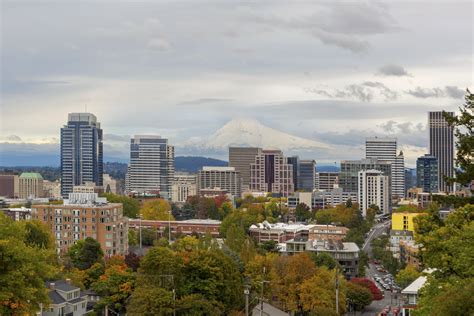 Looking for a great trail near portland, oregon? Portland OR downtown cityscape and Mt Hood Fall Season USA ...