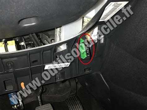 Remove the cover on the left. OBD2 connector location in Peugeot Partner (2015 - 2018 ...