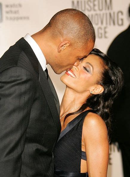 honoree will smith shares a kiss with his wife actress jada pinkett smith at the museum will