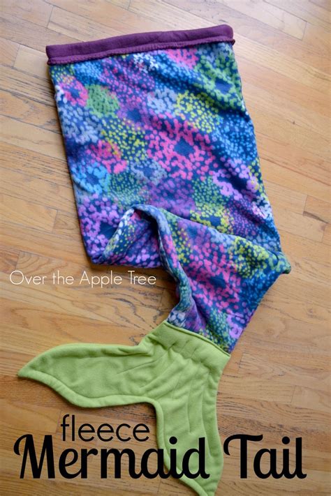 Definitely practice drawing your mermaid tail before drawing and cutting. DIY Fleece Mermaid Tail Blanket, very inexpensive- by Over The Apple Tree | Fleece mermaid tail ...
