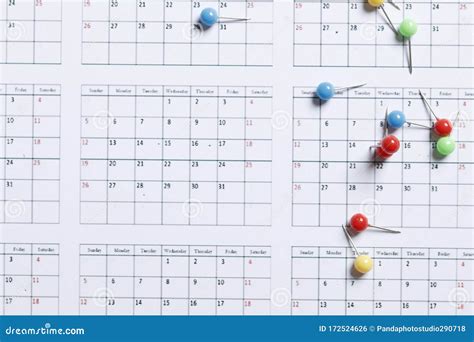Many Colored Pins On The Calendar Place For Text Stock Photo Image