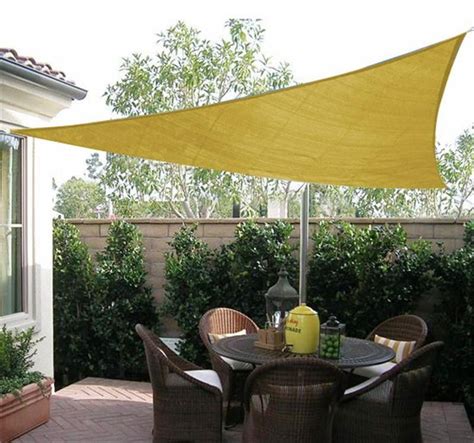 This outdoor canopy looks like a stunning pieces of modern art, don't you think? 16.5' Triangle Sun Shade Sail Canopy-Sand | Patio shade ...