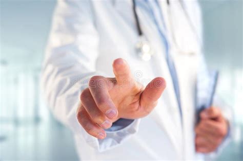 Doctor Pointing His Finger At The Hospital Stock Photo Image Of