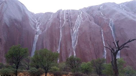 Uluru Closed After Record Breaking Rain Turns Site Into A Giant Waterfall Sbs Nitv