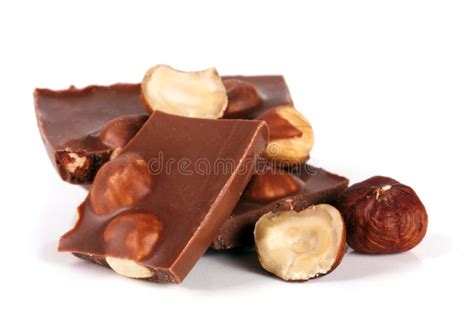 Chocolate With Hazelnuts With Mint Leaves Isolated On White Background