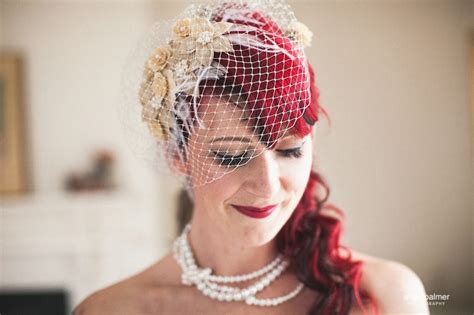 i made my fascinator and birdcage veil from bleached peacock feathers and uncoloured wooden