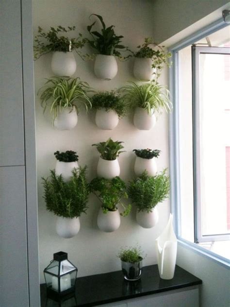 • we found a hanging pot system at ikea and made an herb garden. 20+ AMAZING INDOOR WALL HERB GARDEN IDEAS http ...