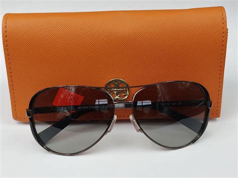 pair of michael kors sunglasses with case able auctions