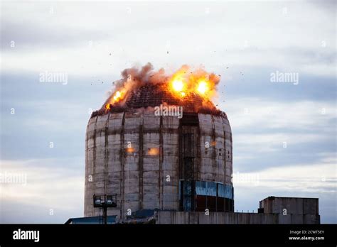Demolition Of Old Industrial Building By Exploding Dynamite Stock Photo