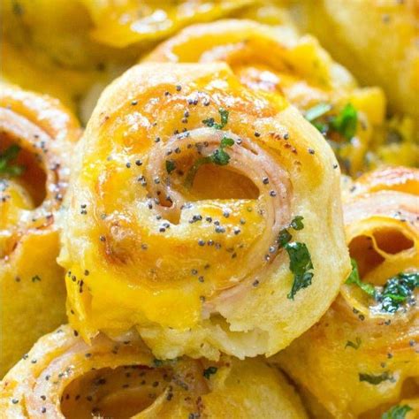 Serving delicious finger foods can be inexpensive the trick is to find delicious appetizer recipes that mimic a traditional dinner menu. These Hot Turkey and Cheese Party Rolls are an Easy Dinner ...
