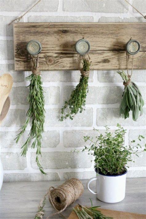 Inside, there are two box fans setup where they blow air directly over the screens, a dehumidifier, and a hygrometer. DIY Herb Drying Rack - Magnolia Market