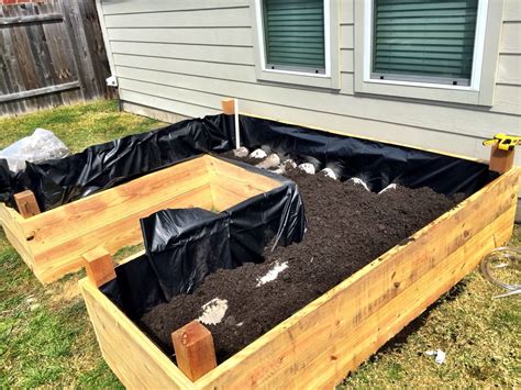Add sand or crushed rock to the bottom of the trench, as this will help level out the ground underneath. Pin on Sub-irrigated raised flower bed/vegetable garden.