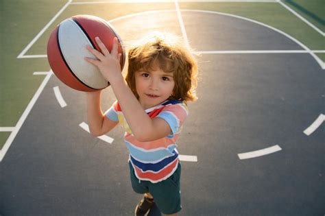 Premium Photo Child Boy Preparing For Basketball Shooting Active