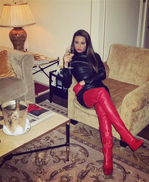 Bootmonth Having A Glass Of Champagne In Crotch High Red Leather
