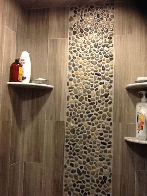 A pebble tile shower floor with no seams! 15 Chic Bathroom Tile Ideas | Ultimate Home Ideas