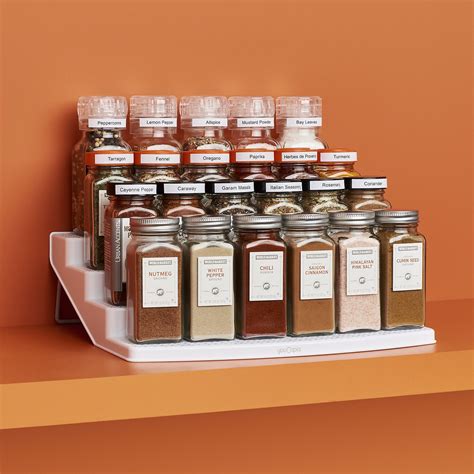 Available in right or left facing configuration, this system utilizes lost upper cabinet space to store up to 36 standard spice bottles, all easily accessible with one simple down and forward motion. YouCopia - SpiceSteps 24-Bottle Cabinet Spice Rack