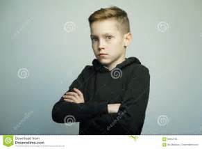 These are all popular times for boys to get spiffed up. Teenage Bad Boy With Stylish Haircut, Studio Shot Stock ...