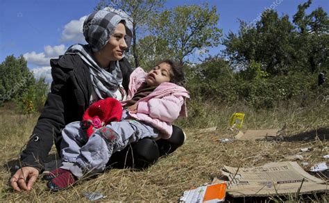 Syrian Refugee Mother Daughter Stock Editorial Photo © Vilevi 32320647
