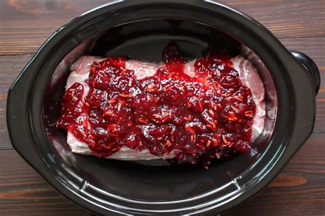 An easy crock pot dinner that the whole family will love. Slow Cooker Cranberry Pork Loin - The Magical Slow Cooker