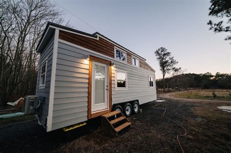 If you want a home without spending a fortune, then a tiny house is your perfect solution. 28ft Tiny House on Wheels with a Downstairs Bedroom