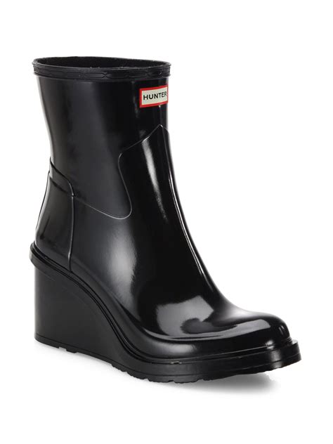 hunter rubber original refined short mid wedge gloss rain boots in black lyst