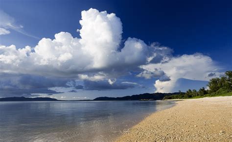 Cumulus Clouds Over Calm Body Of Water Hd Wallpaper Wallpaper Flare