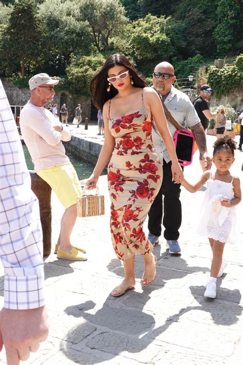 Kylie Jenner Wears Flats And Bodycon Dress With Daughter Stormi In Italy