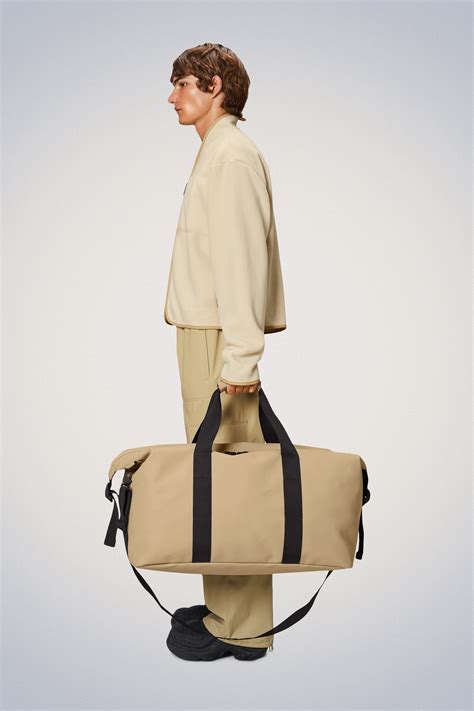 Rains® Hilo Weekend Bag Large in Sand for $140 | Free Shipping