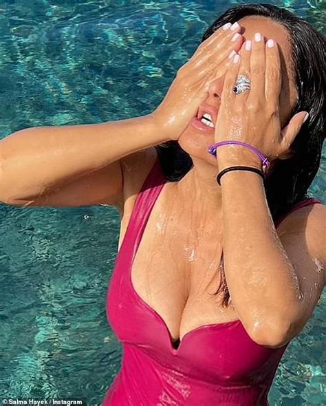 Salma Hayek Puts On A Busty Display In A Pink Swimsuit As She Larks Around With Billionaire