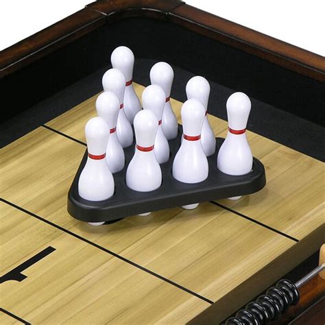 You can play this game one on one or with two teams of two people. The Level Best Shuffleboard Bowling Accessory Kit ...