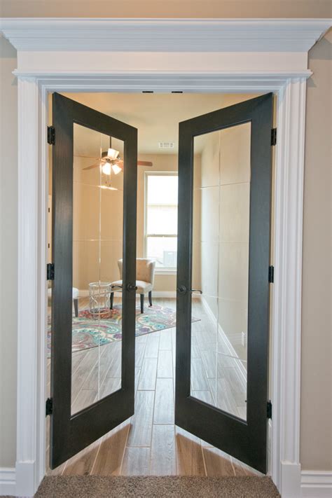 Interior glass doors can be customized to fit your space and personal design aesthetic. Office with Double Glass Doors - Transitional - Home Office - Oklahoma City - by Westpoint Homes