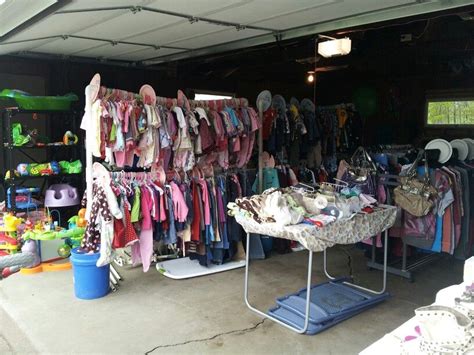 Garage sale organizing. hang all clothing and sort by size. it says you