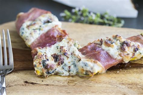 Spoon out the interior flesh from each zucchini (leave skin on). Cheesy Stuffed Zucchini Boats - Cooks with Cocktails