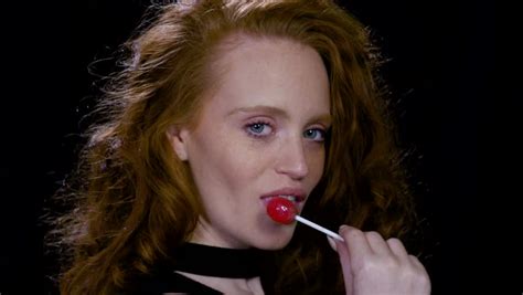 Sexy Redhead Licking Lollipop Stock Footage Video 100 Royalty Free