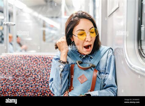 Sleepy Woman Yawn In Train Or Metro Sleepless And Insomnia Concept